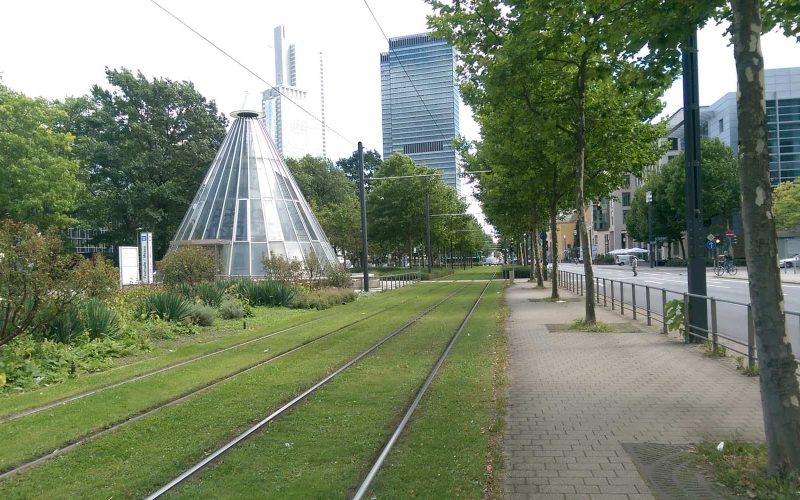 Tram tracks in Frankfurt, Germany. The spiral structure is the entry to Metro station